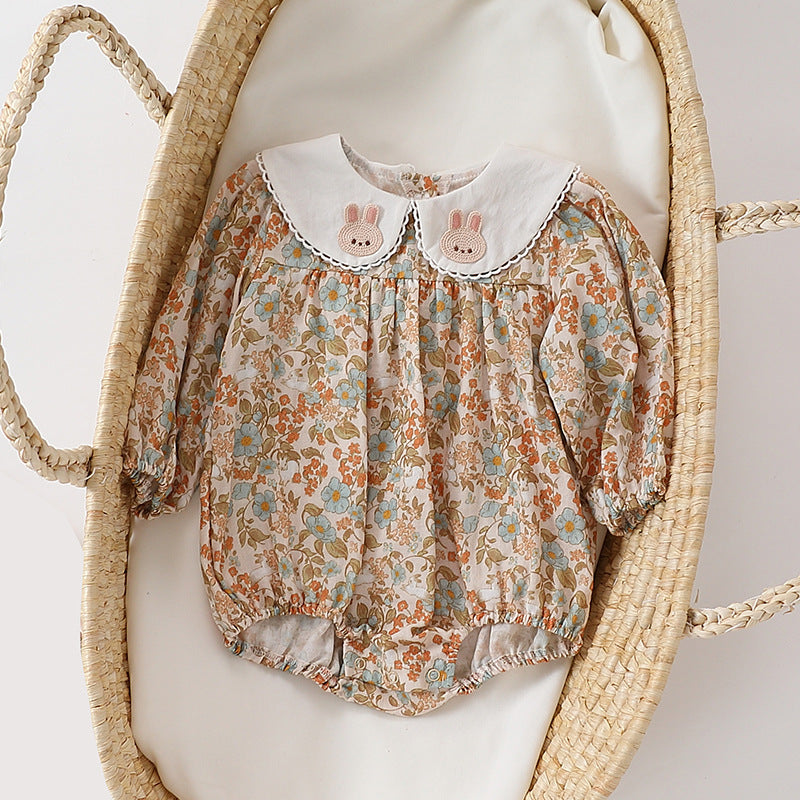 Floral organic cotton long sleeved girl romper
