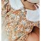 Floral organic cotton long sleeved girl romper