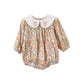 Floral organic cotton long sleeved girl romper