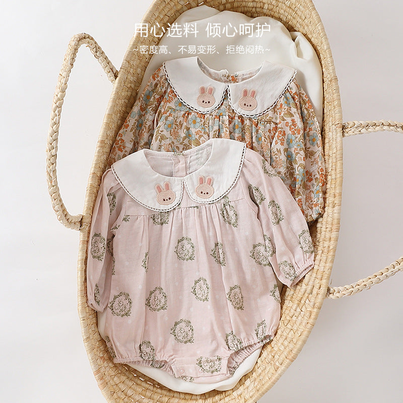 Floral organic cotton long sleeved girl romper