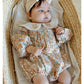 Floral organic cotton long sleeved girl romper